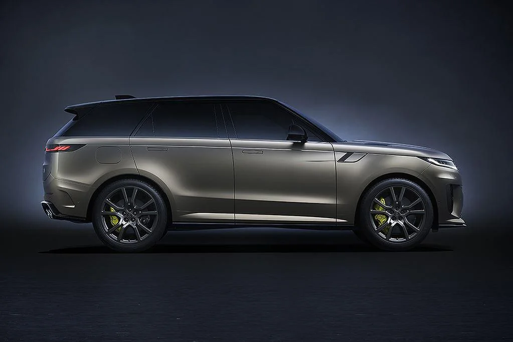 Studio-lit performance SUV photographed in profile.